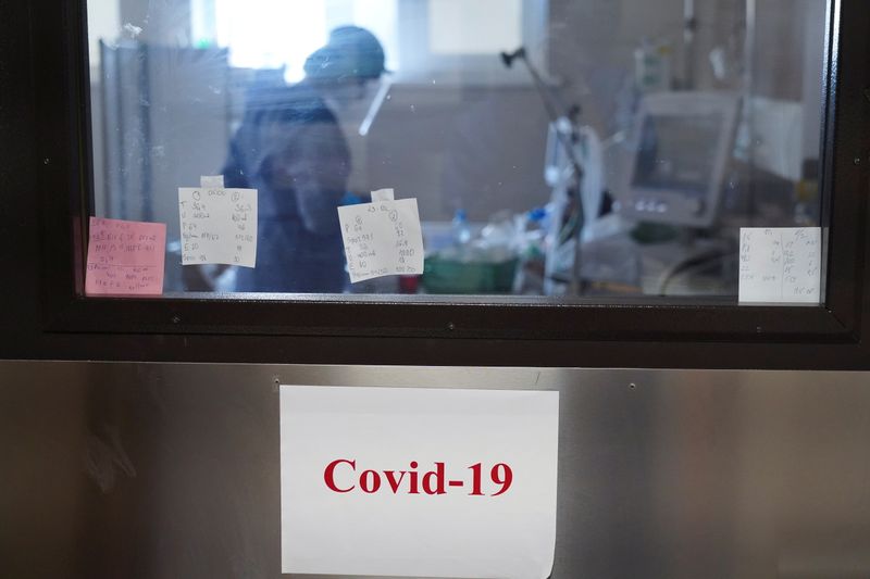FILE PHOTO: Patients undergo COVID-19 treatment at a Riga East
