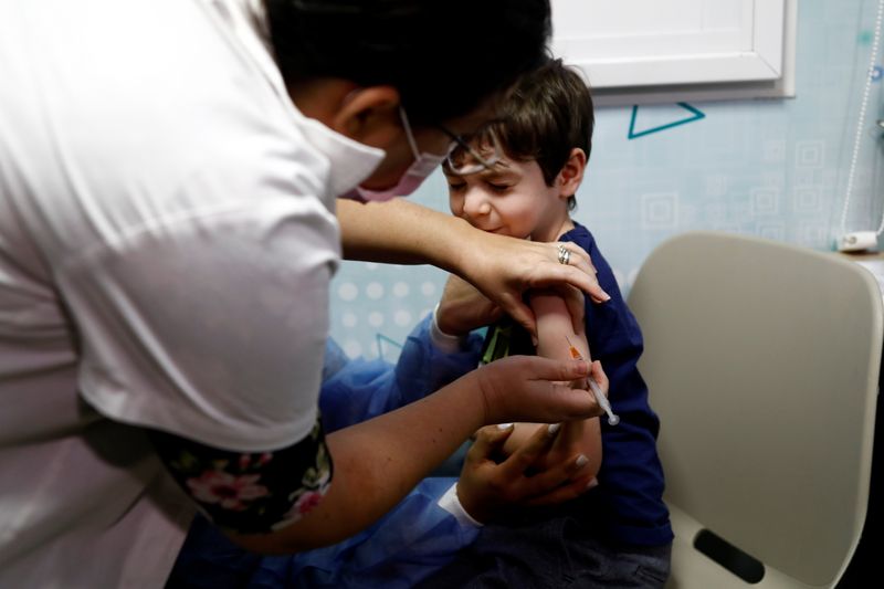 Itamar receives his first COVID-19 vaccination, after the country approved
