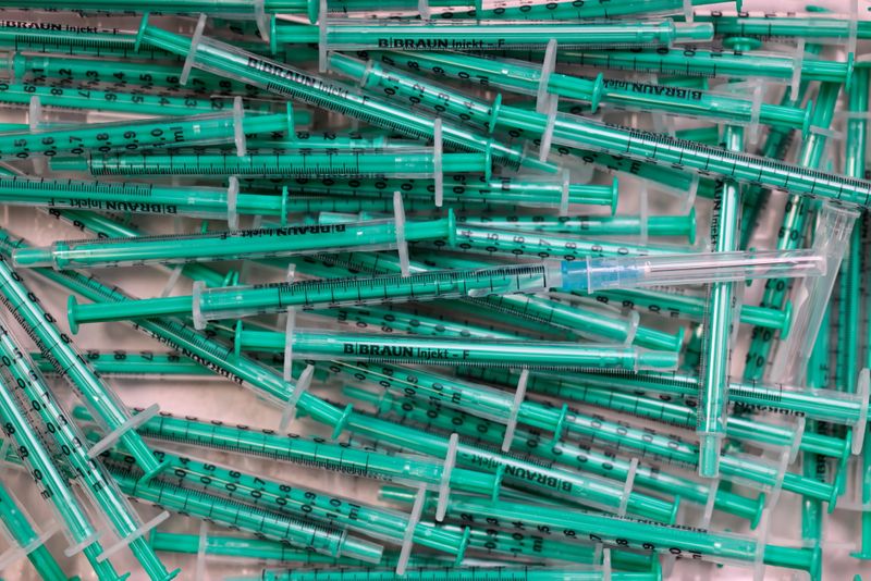 FILE PHOTO: COVID-19 vaccination syringes at a doctor’s office in