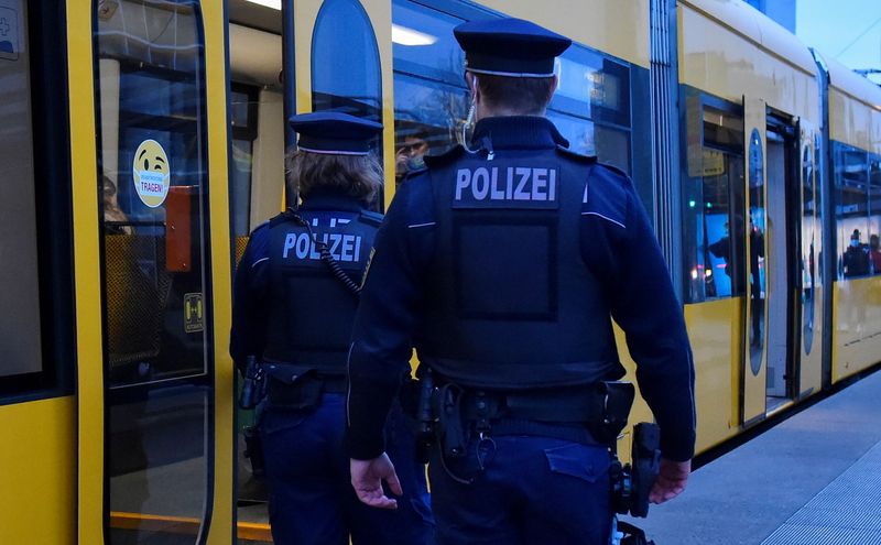 FILE PHOTO: Police check COVID-19 measures in Dresden