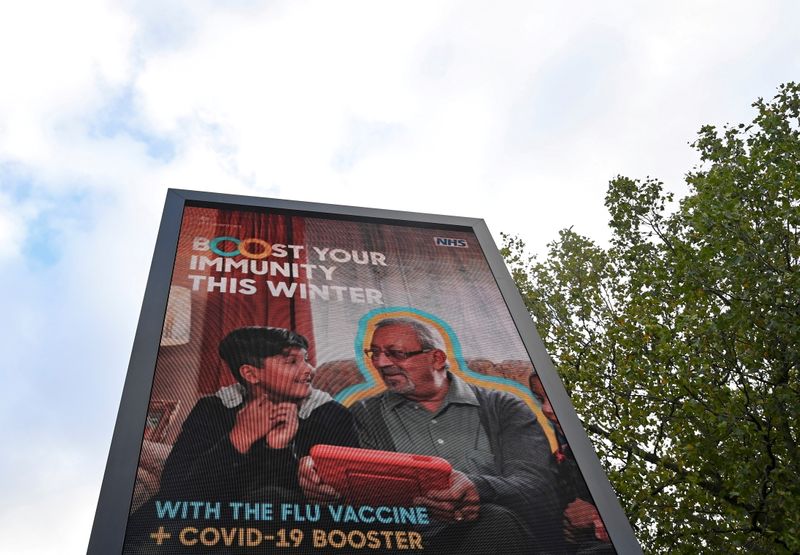 FILE PHOTO: An NHS COVID-19 vaccination health campaign advertisement is