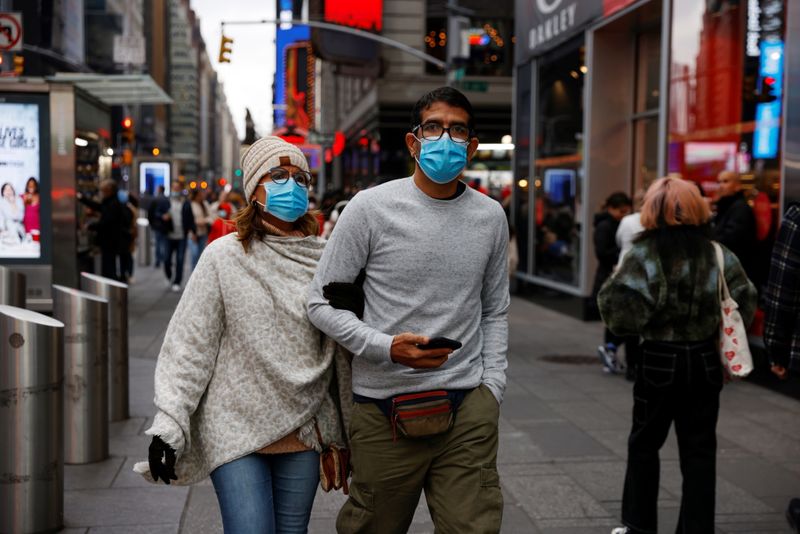 People wearing protective face masks, amid the coronavirus disease (COVID-19)