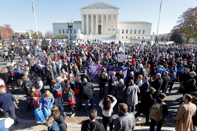 FILE PHOTO: Anti-abortion and pro-abortion rights protesters gather outside Supreme
