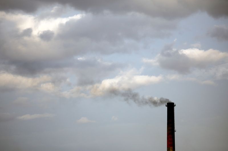 FILE PHOTO: Smoke rises from a coke factory in the