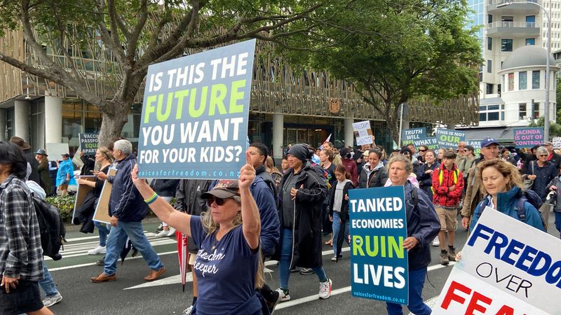 Thousands protest COVID-19 rules as New Zealand marks 90% vaccine