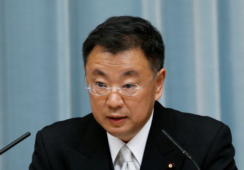 Matsuno speaks at a news conference at Prime Minister Shinzo