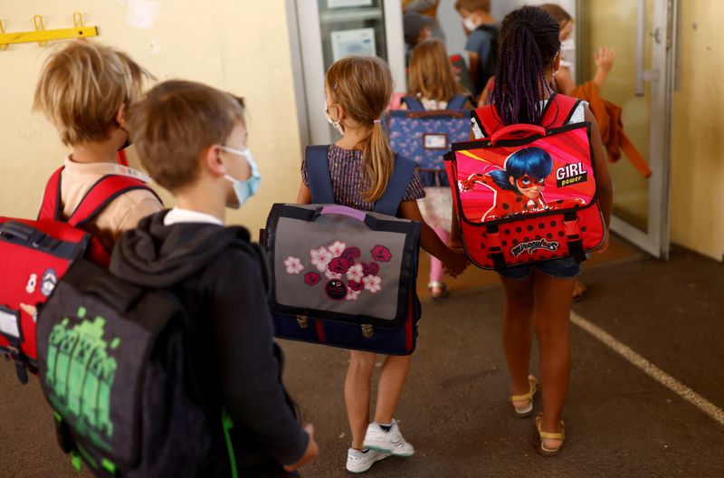 FILE PHOTO: French children and teenagers head back to school