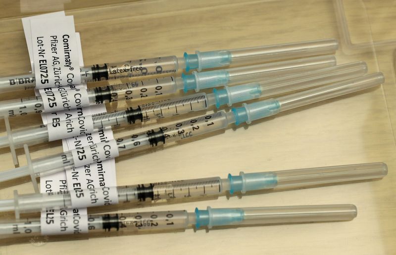 FILE PHOTO: Syringes are seen at the Impfzentrum Basel Stadt