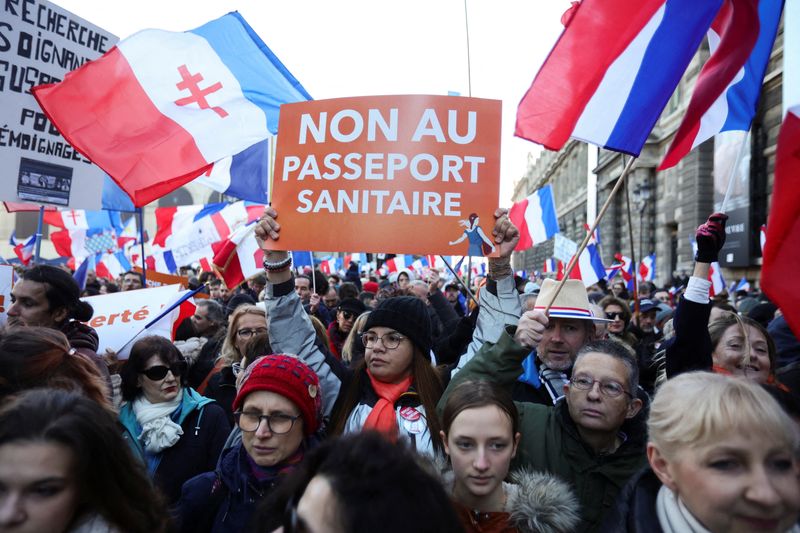 People protest in Paris against COVID-19 health pass
