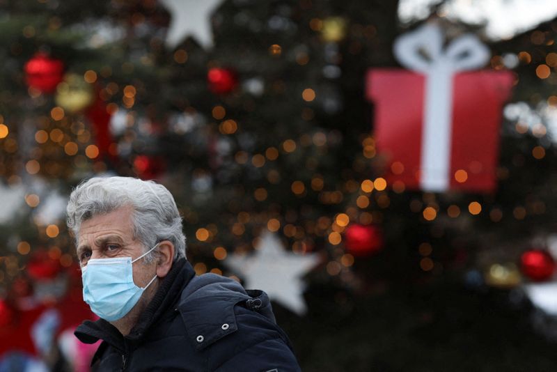 Greece bans public Christmas festivities to curb Omicron spread.