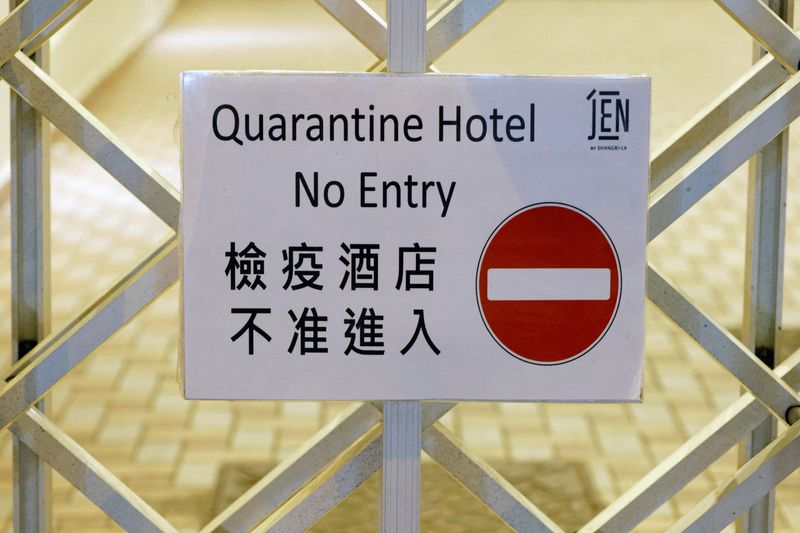 FILE PHOTO: A sign is seen inside a quarantine hotel,