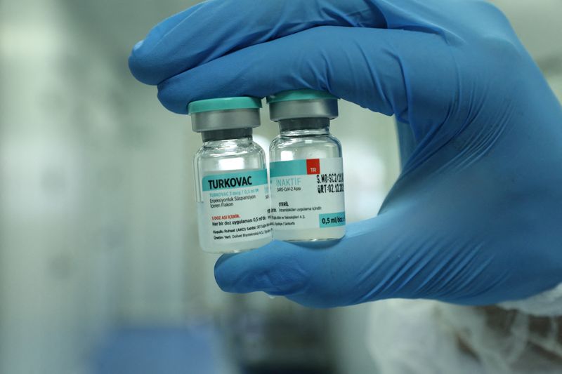 A health worker holds vials of Turkey’s domestically developed Turkovac