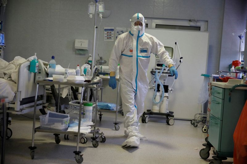 FILE PHOTO: Medical staff members treat patients inside the coronavirus