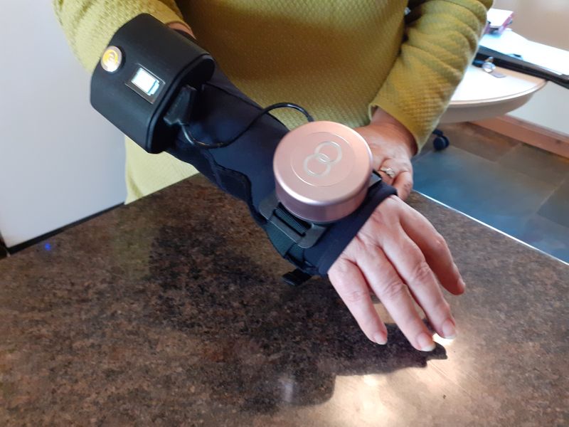FILE PHOTO: Glove with built-in spinning gyroscope for Parkinson’s disease