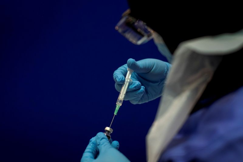 FILE PHOTO: A phial of the Pfizer/BioNTech COVID-19 vaccine concentrate