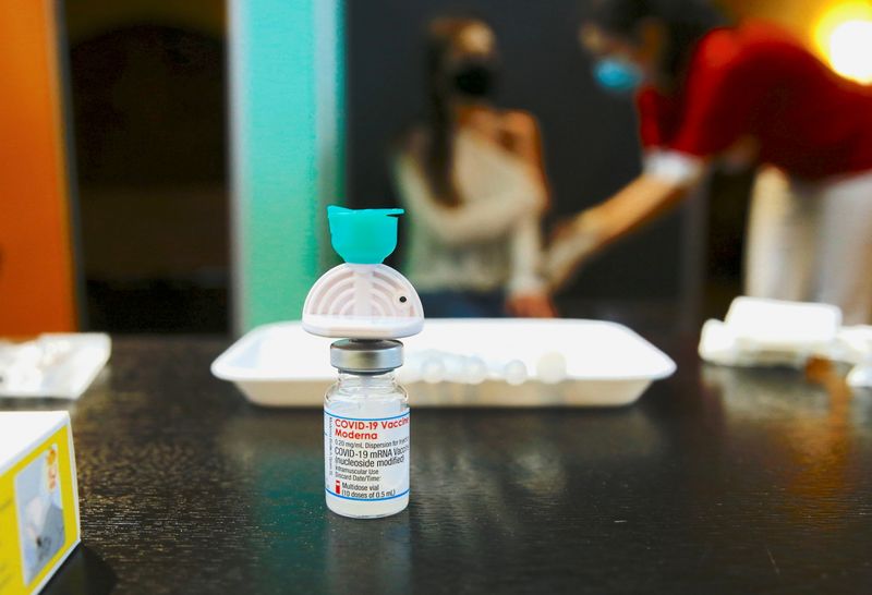 FILE PHOTO: A vial containing the Moderna COVID-19 vaccine is