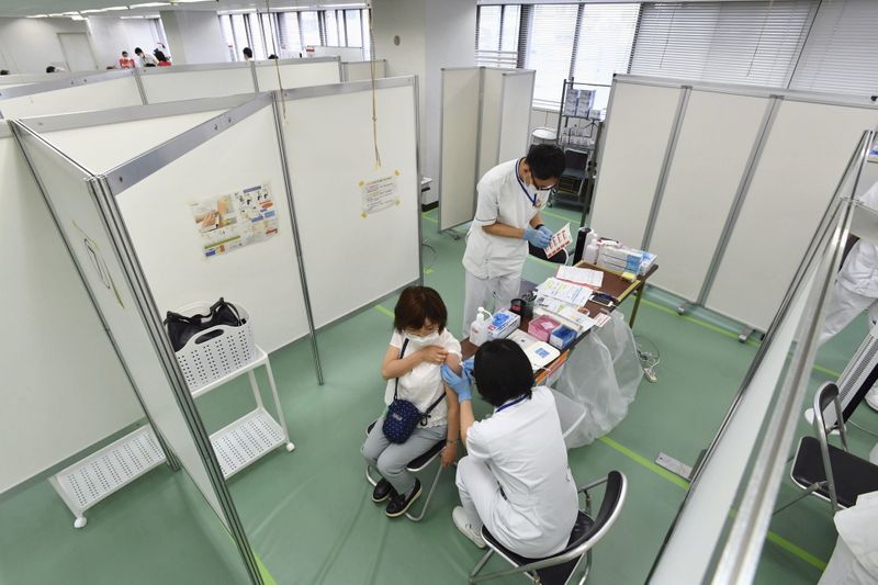 A large-scale coronavirus disease (COVID-19) vaccination centre opens in Osaka