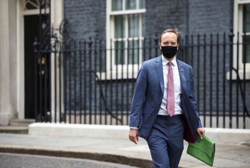 Britain’s Health Secretary Matt Hancock walks on Downing Street in