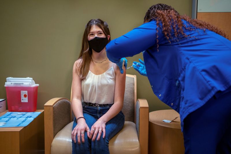 FILE PHOTO: FILE PHOTO: CDC approves Pfizer vaccine for teenagers