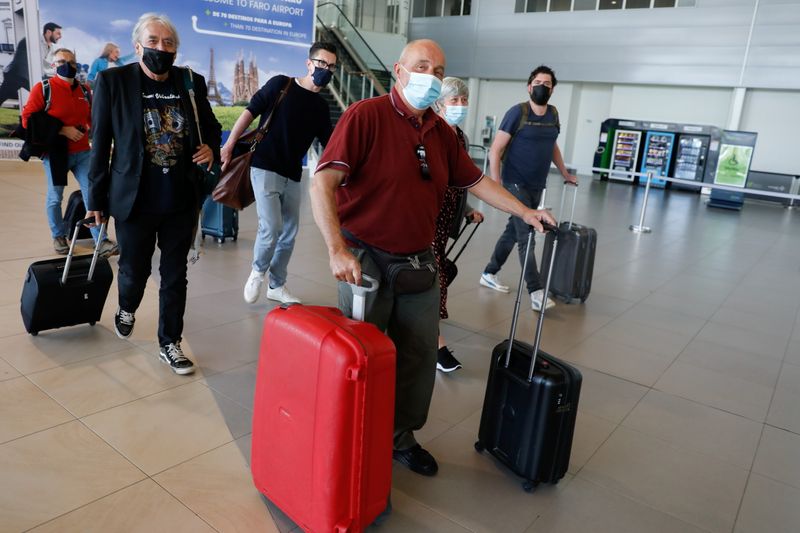 FILE PHOTO: British tourists return to Portugal