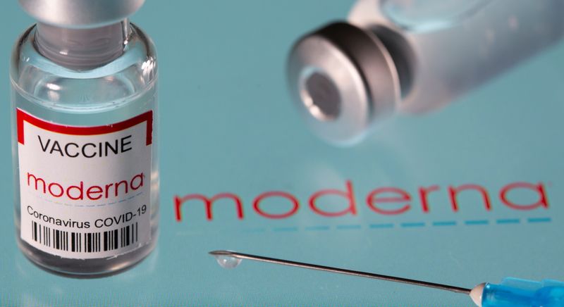 Vial labelled “Moderna coronavirus disease (COVID-19) vaccine” placed on displayed