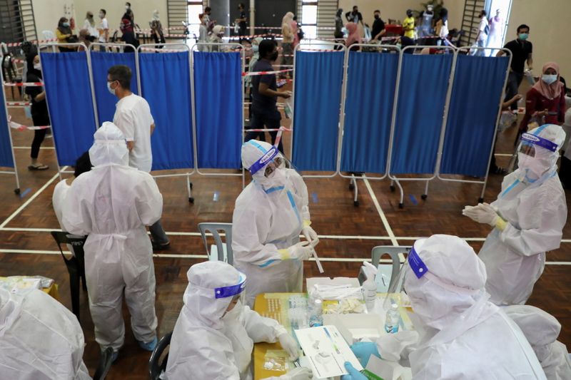 Medical personnel work at a coronavirus disease (COVID-19) testing centre