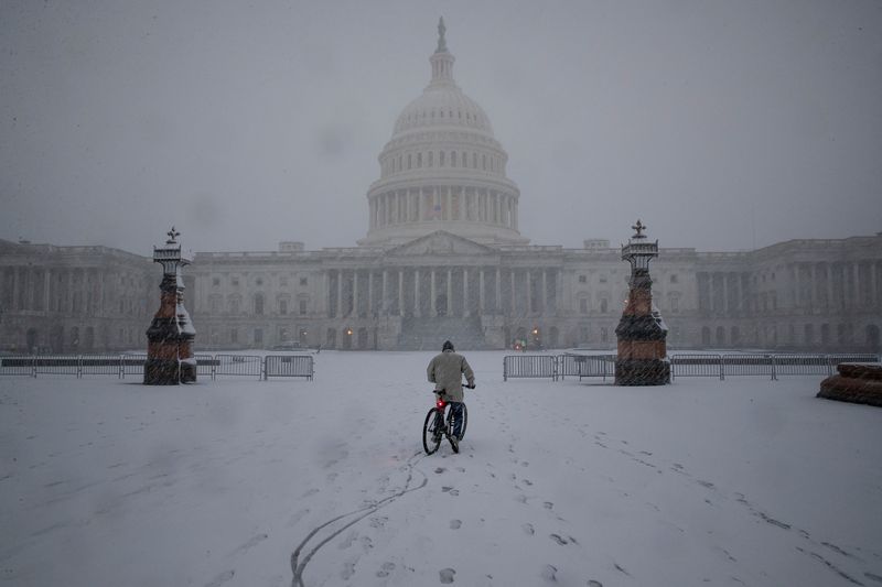 Snow falls during a winter storm on Capitol Hill, in