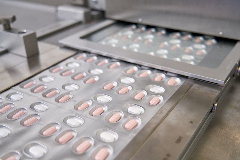 FILE PHOTO: Pfizer’s COVID-19 pill, Paxlovid, is manufactured and packaged