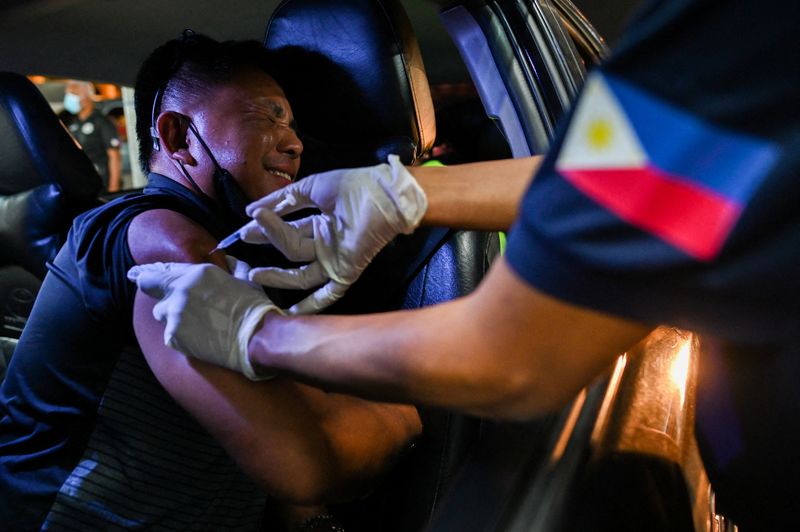 24/7 drive-through vaccination in Manila