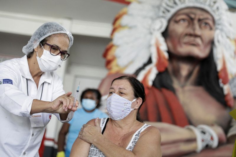 FILE PHOTO: COVID-19 vaccinations at Cacique de Ramos, Rio de