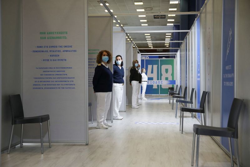 Greek Army Medical Personnel members stand at the hallway of