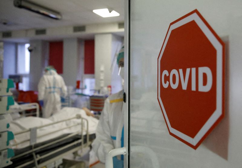FILE PHOTO: Medical staff members treat patients inside the coronavirus