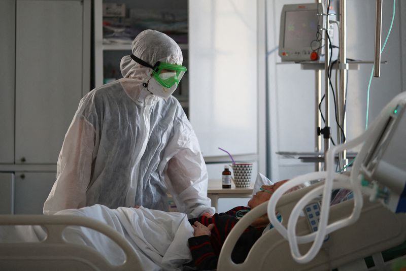 Medical specialists treat COVID-19 patients at a hospital in Volgograd