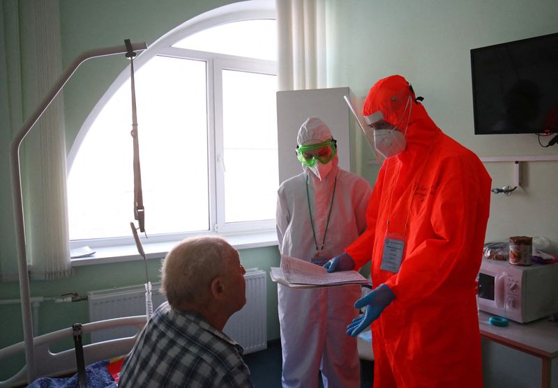 Medical specialists treat COVID-19 patients at a hospital in Volgograd