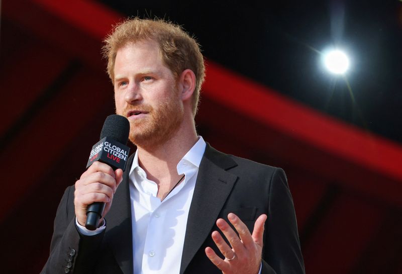 FILE PHOTO: Britain’s Prince Harry vows to finish late mother