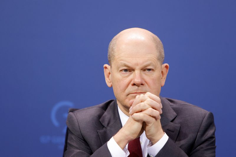 German Chancellor Scholz attends a news conference on latest COVID-19