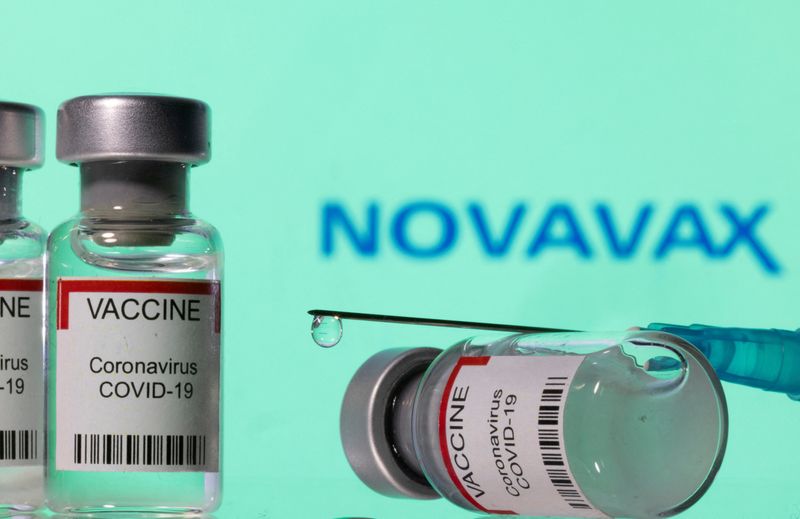 FILE PHOTO: Illustration shows vials labelled “VACCINE Coronavirus COVID-19” and
