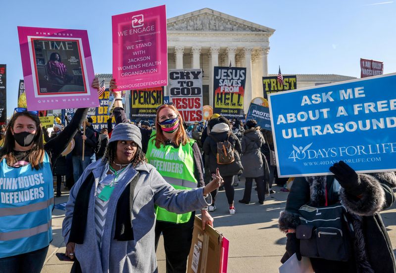 FILE PHOTO: Anti-abortion and pro-abortion rights protesters gather outside Supreme