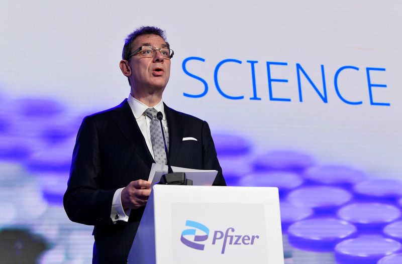 Pfizer CEO Albert Bourla talks during a press conference after