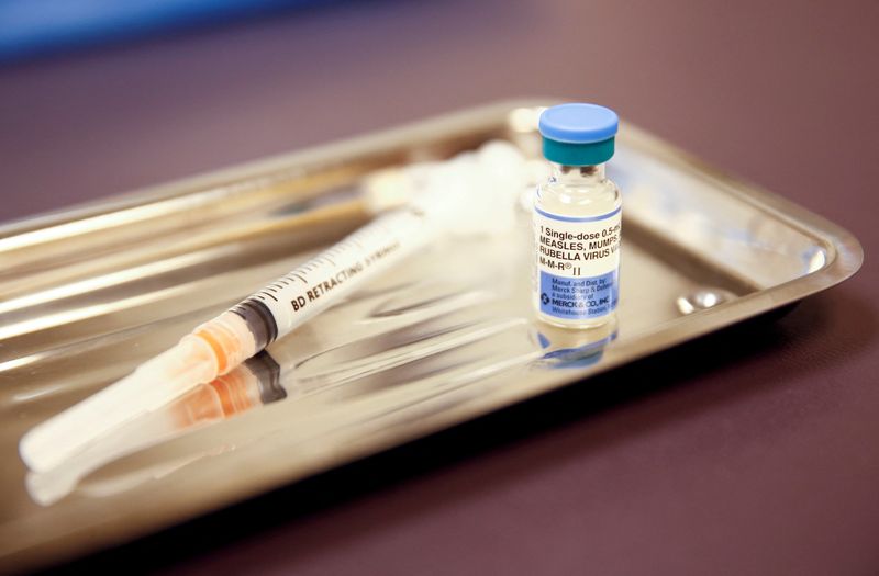 FILE PHOTO: A vial of the measles, mumps, and rubella