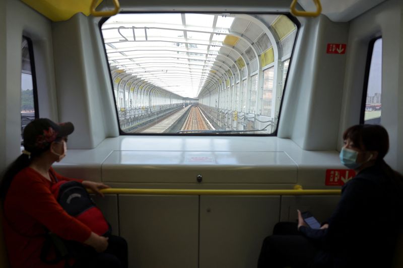 Commuters ride subway in New Taipei