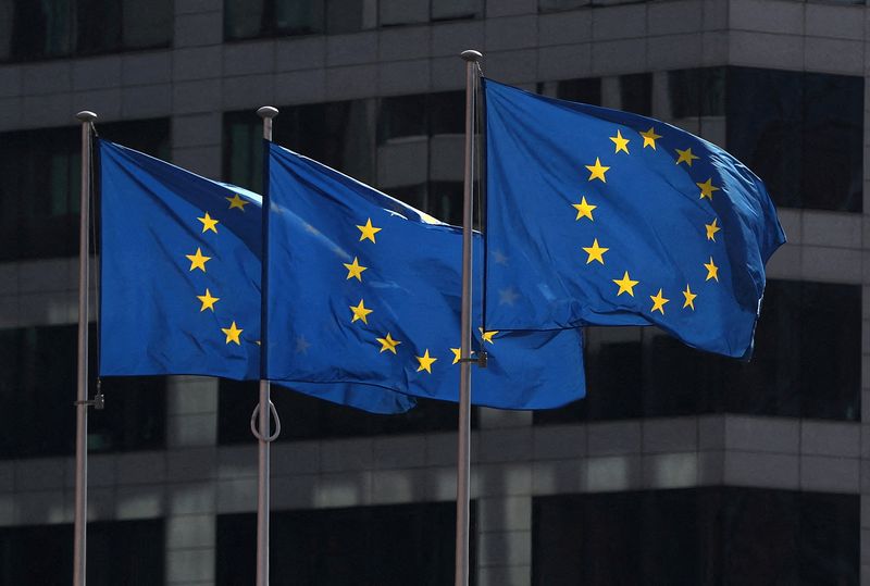 FILE PHOTO: European Union flags fly outside the European Commission