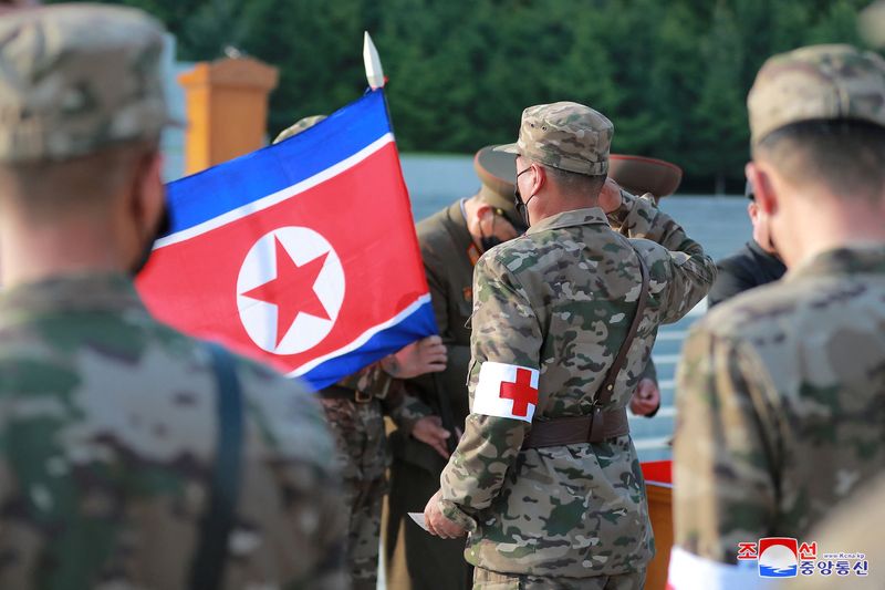 Military personnel from the Korean People’s Army medical corps attend