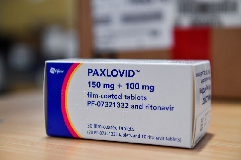 FILE PHOTO: Pfizer and MSD oral COVID-19 pills arrive at