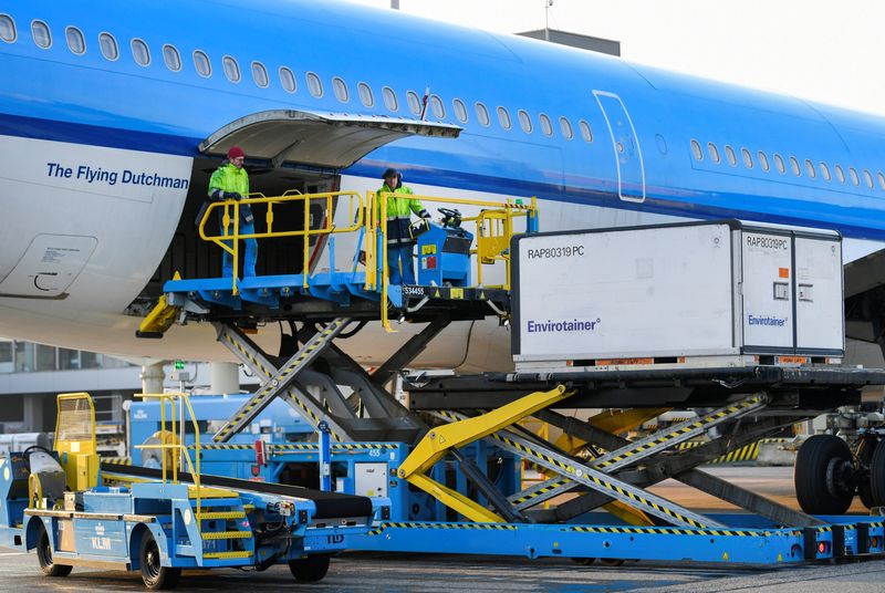 Cool boxes are being transported by airplane at Amsterdam’s Schiphol