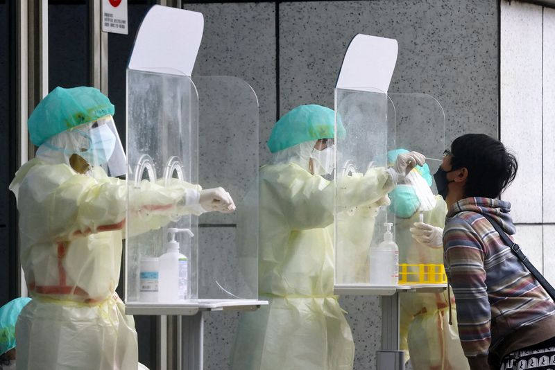 A person gets a coronavirus disease (COVID-19) test, in Taipei