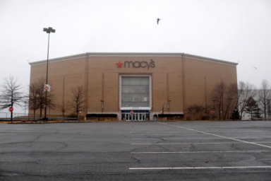 FILE PHOTO: A shuttered Macy’s store and empty parking lot
