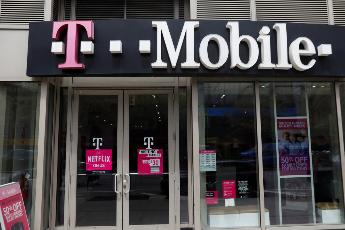 A sign for a T-Mobile store is seen in Manhattan,