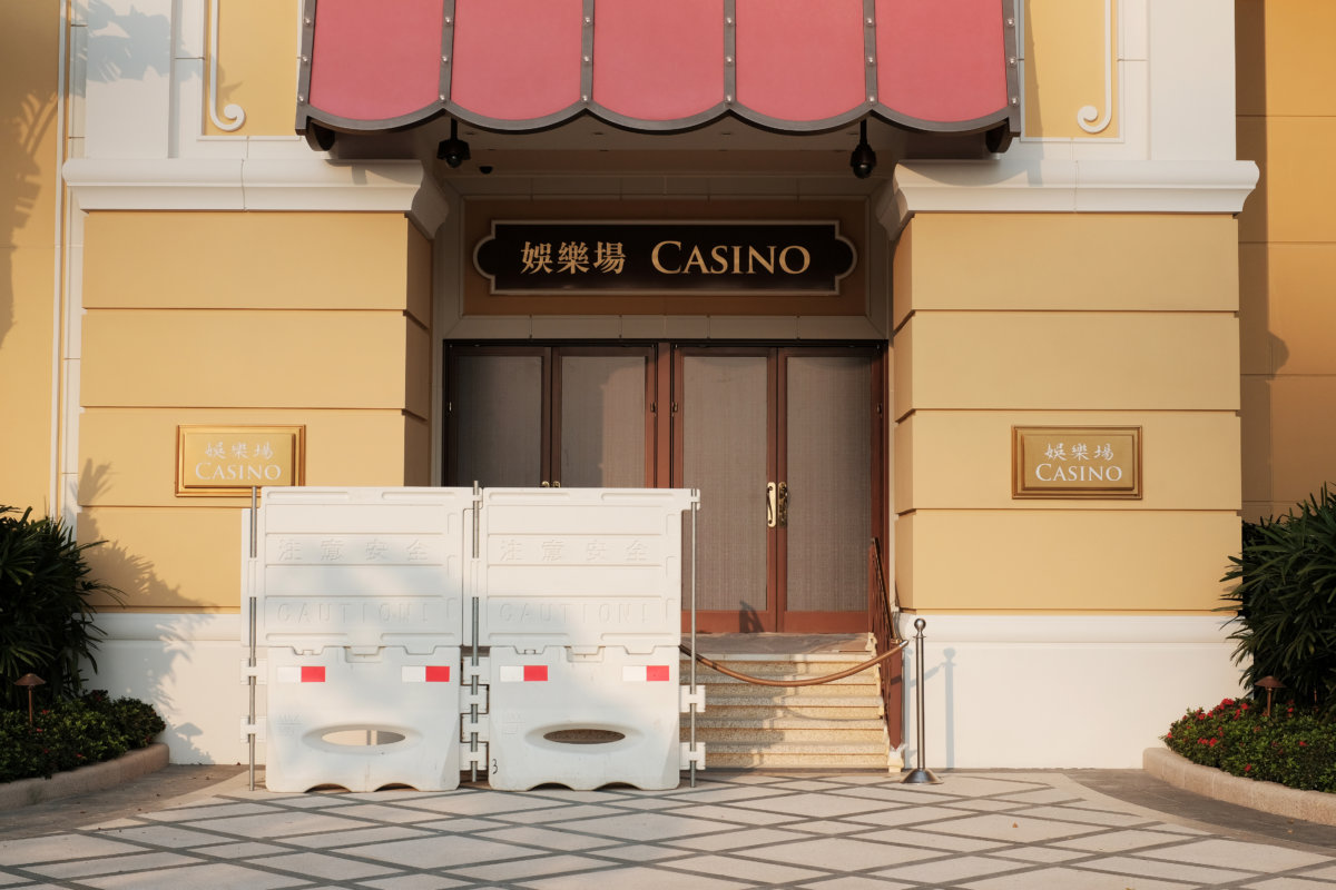Barriers block a closed entrance to the Wynn Macau casino