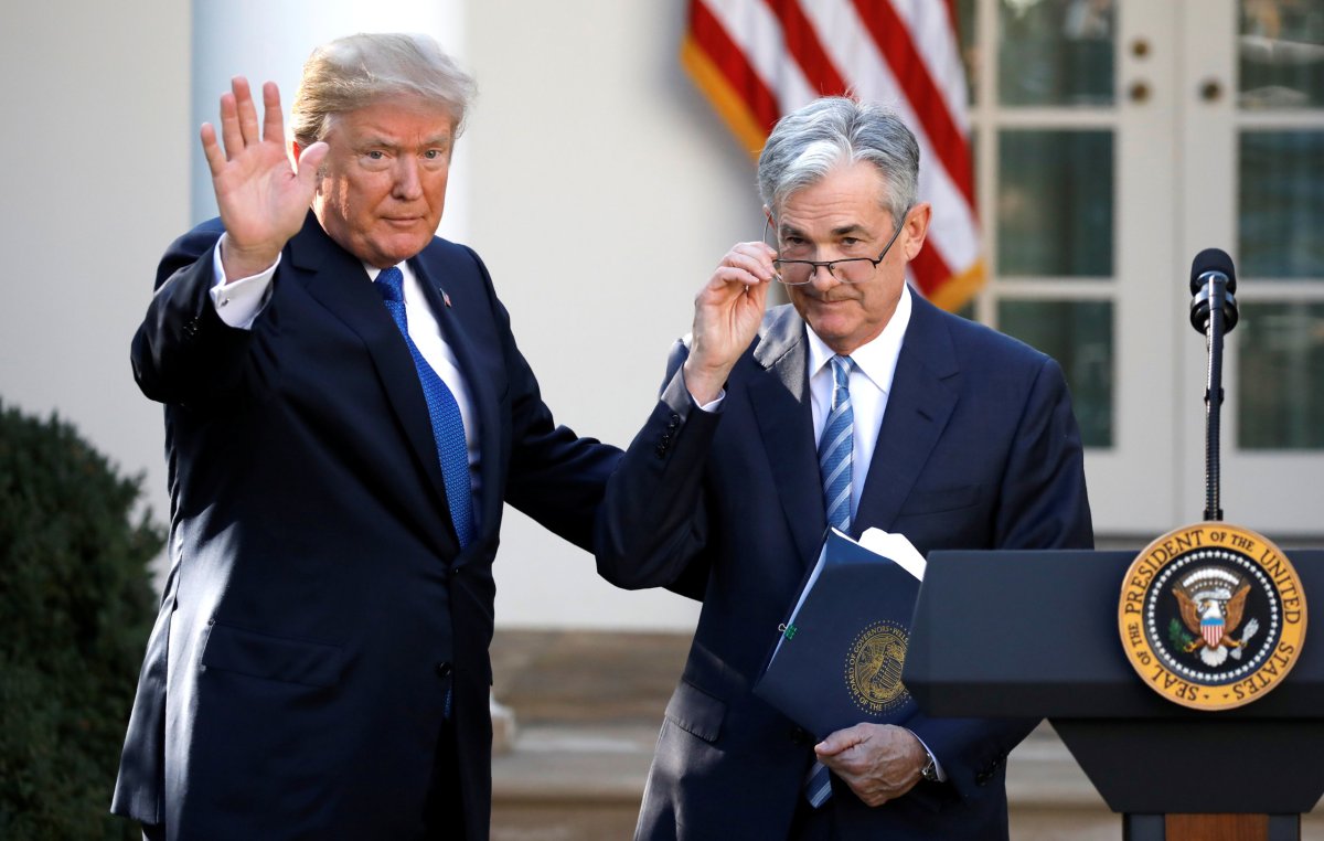 U.S. President Donald Trump gestures with Jerome Powell, his nominee